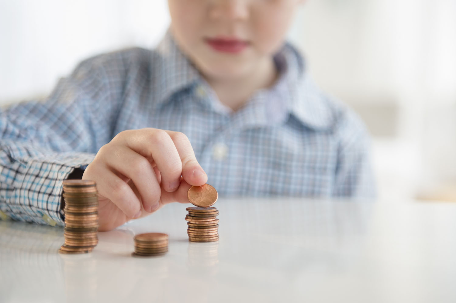 Kaip vaikus išmokyti, kad pinigai nėra begaliniai?